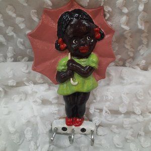Vintage African American girl cast iron wall hooks holder with umbrella